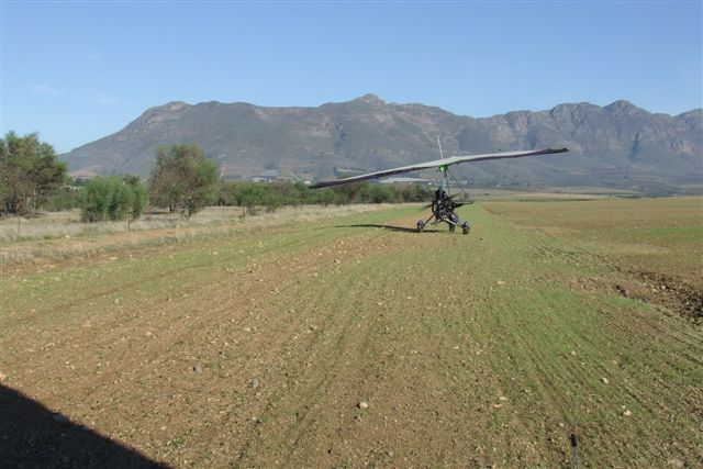 First we landed on what looked like a strip but was just the peripheral end of a freshly plowed and sown land look at those rocks.JPG