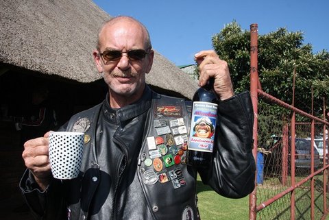 Andre, coffee and bottle.JPG