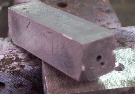 Hammering bloch, with 2,, hole drilled in..JPG