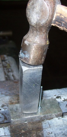 Moer it with a hammer......JPG